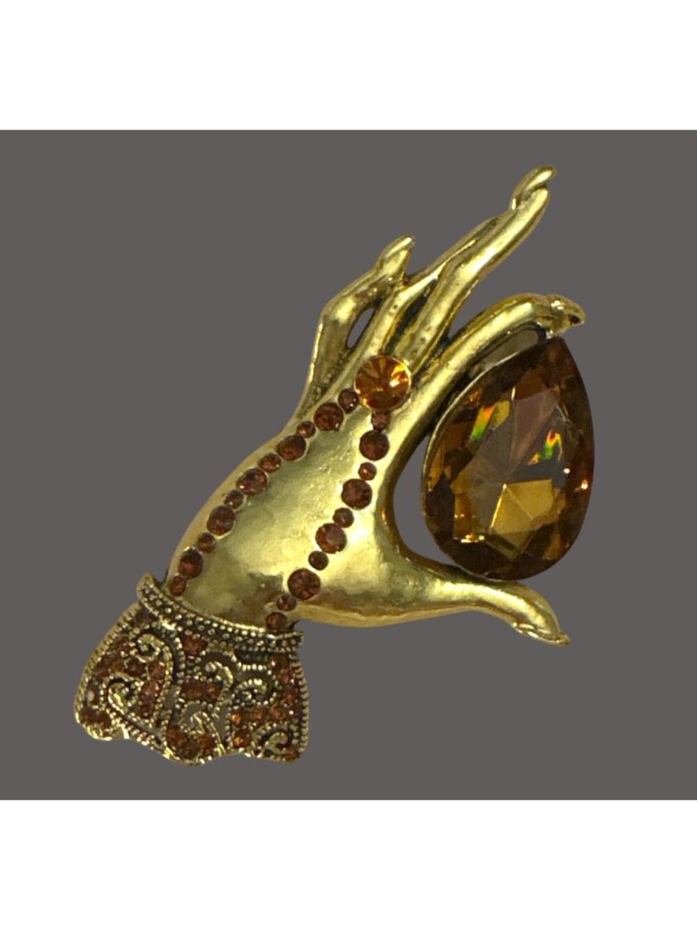 Brooch. Art Deco Elegant Hand Holding Faceted Tear Drop Amber Crystal.
